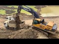 Awesome Big Volvo EC480L Excavator Loading Dump Truck Moving Dirt In Action