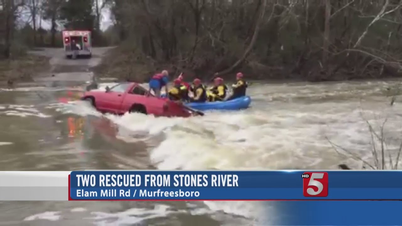 Two Rescued After Flood Waters Push Truck Into River - YouTube