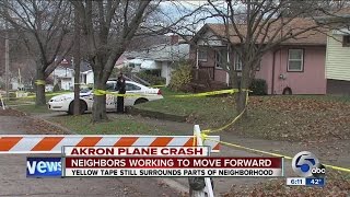 Residents living near Akron plane crash site share their close calls, fears and hope for healing