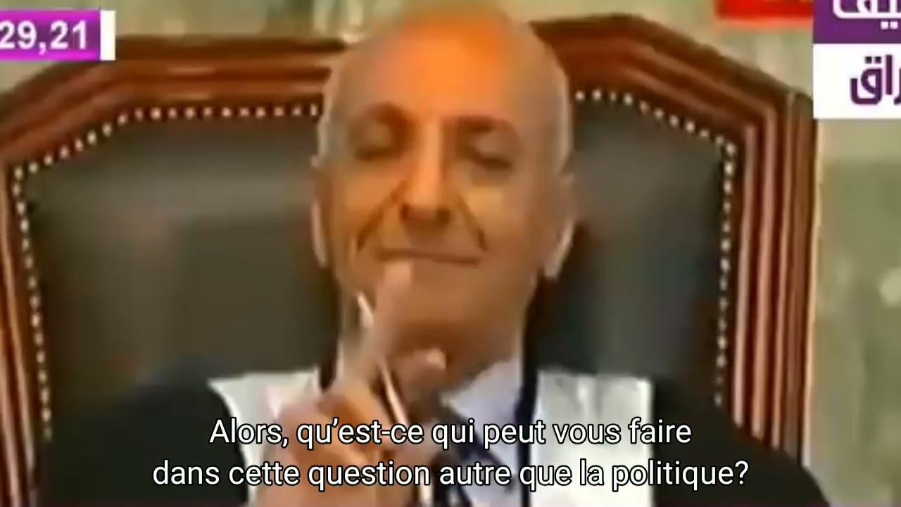 Dbat entre Saddam Hussein et le juge du Tribunal M Rauf