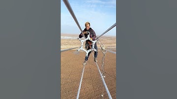 Why Do Workers Install These Strange Devices on High-Voltage Power Line ?