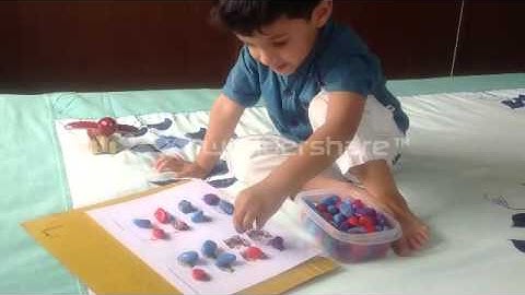 Moksh busy with "Same & Different" File folder Game/ Activity