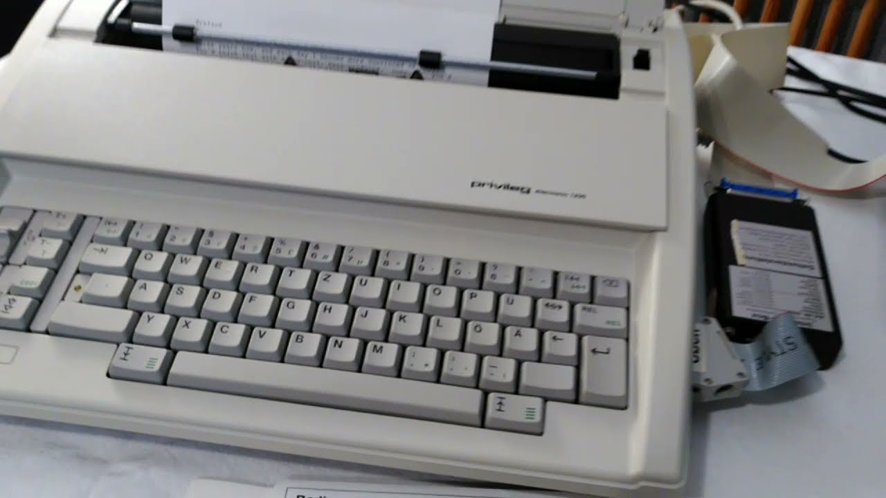 Tandy TRS-80 Model 1 prints to an electronic type wheel typewriter PRIVILEG 1200