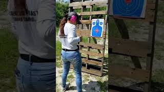 Students learn how to draw from a holster and shoot on the move.