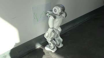 NAO: The first robot to write his name (a bit on the wall)