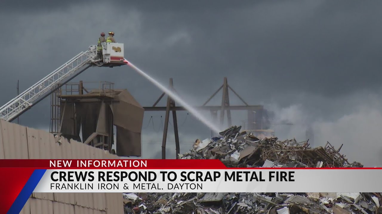 Crews battle scrap metal fire in Dayton YouTube