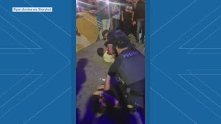 Videos show incident on 6th Street that led to APD officer's removal from patrol