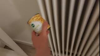 Quickly dragging a can of corn across a radiator