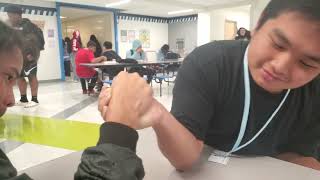 Arm-Wrestling On The Lunch Table