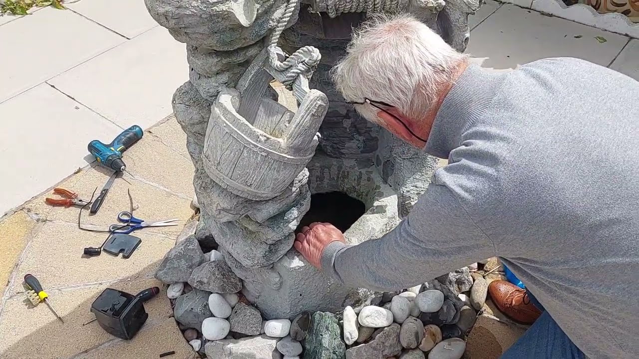 Water fountain, how to fix. John is getting stuck in. He is a diamond. This man. Helping  me.