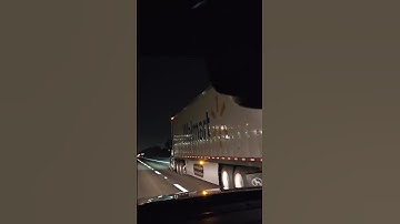 SWIFT TRANSPORTATION PULLING A WALMART TRAILER