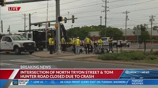 Crash shuts down busy Charlotte intersection and light rail service