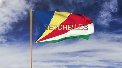 4K Seychelles flag with title waving in the wind. Looping sun rises style. Animation loop Stock