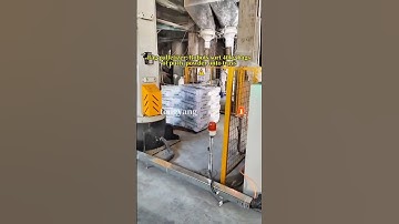 Bag palletizer:Robots sort 40kg bag s of putty powder onto trays. #machine #industrial #robot