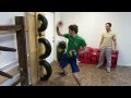 Lo Man Kam Wing Chun - Gorden Lu and Edwin demonstrates the training on the tire dummy