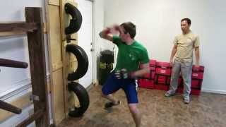 Lo Man Kam Wing Chun - Gorden Lu and Edwin demonstrates the training on the tire dummy