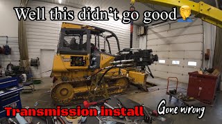 Back installing transmission pumps on Deere 650J dozer after one busted, but we had an epic fail