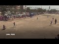 Baseball becomes a shelter for Venezuelan children in soccer crazy Peru