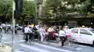 Vietnam Traffic: Motorcycles starting from the traffic lights