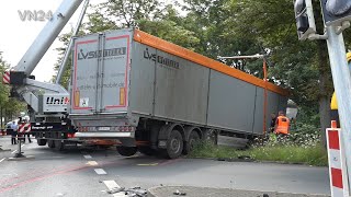 08/05/2021 - VN24 - After truck accident on intersection, semitrailer truck drives into ditch