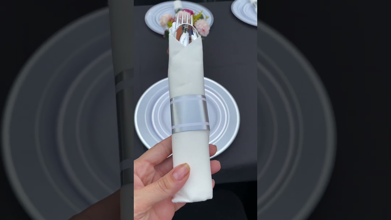 Disposable silver party plates, silverware and cups 