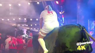 Girl In White Clothes Riding On A Bull In Benidorm | Mechanical Bull Riding 4K
