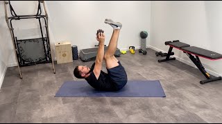 Dumbbell Suitcase Crunch