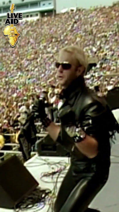 Judas Priest with Living After Midnight. Watch the full video in the official Live Aid channel now.