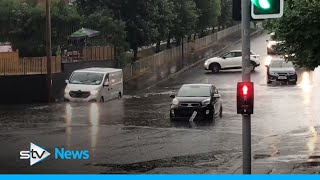 Torrential downpours flood rail lines, roads and businesses in Glasgow