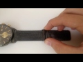 How to Adjust a Watch Clasp on a Metal Mesh Strap
