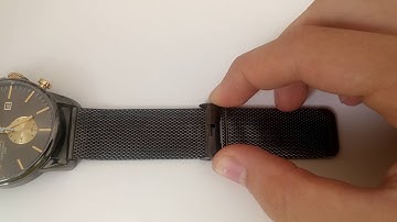 How to Adjust a Watch Clasp on a Metal Mesh Strap