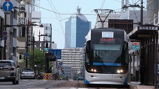 【タワー111とともに】0600形0606編成 ポートラム 青 南富山駅前行き 西町停留場到着