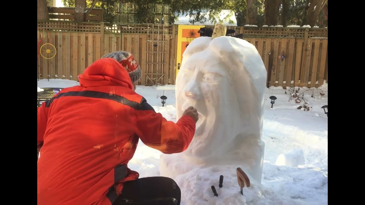Carving Mick Jagger in snow.