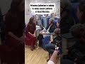 Princess Catherine is talking to some cancer patients at Royal Marsden.