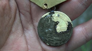 Found a soldier with a medal in the Iron River, Cool Finds