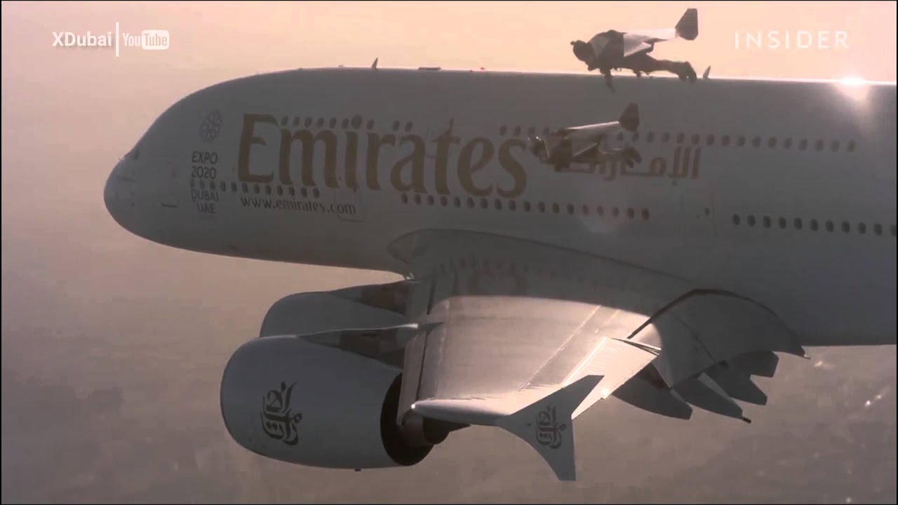 Watch Two Men in Jetpacks Fly Alongside a Jumbo Jet Over Dubai