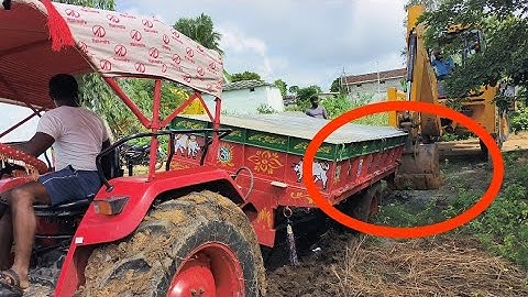 Mahindra Yuvo 575 Did 4WD struck taking moving JCB 3DX hard work (srihari JCB stunts)