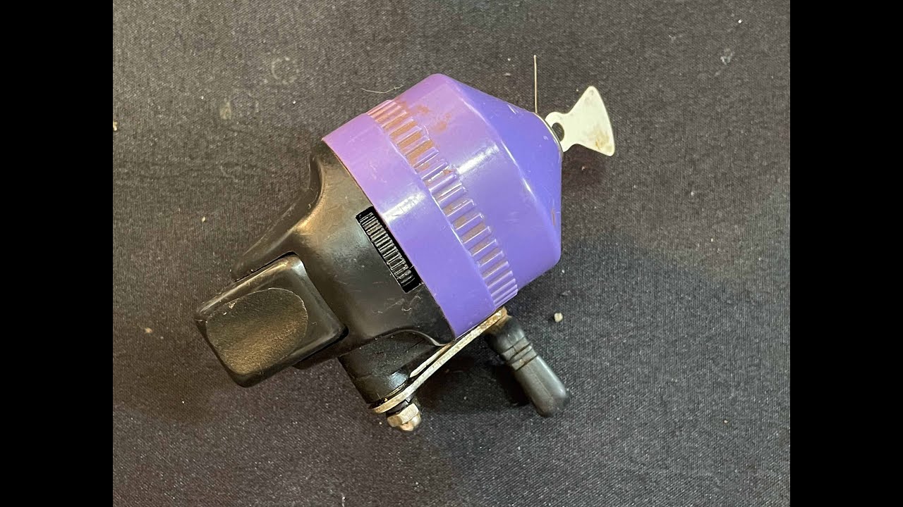 No Name Purple Spincast Reel -- Service and Lubrication -- Young