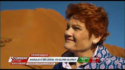 Pauline Hanson climbs the Rock