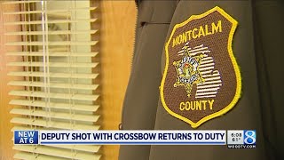 Deputy shot with crossbow returns to duty