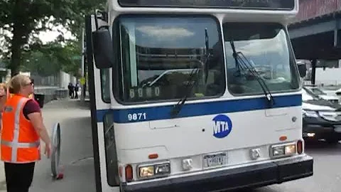 MTA Bus Company: 1999 OBI Orion V CNG #9871 on the Metro North Shuttle Bus.