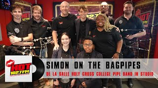 The De La Salle Holy Cross College pipe band visits Hot 102.7FM