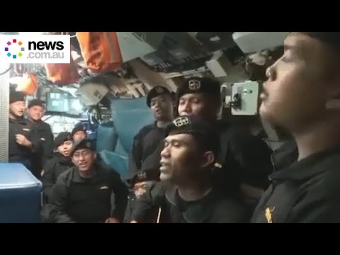 Sunken Indonesian submarine crew sing farewell song