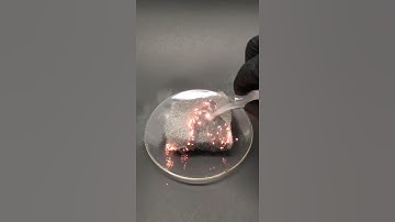 Pouring liquid oxygen onto steel wool