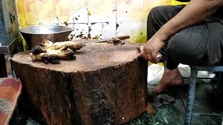 How pork limbs are prepared for cooking at INA Market, Delhi