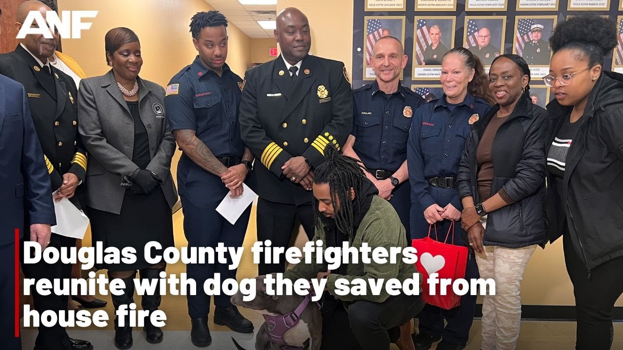 Douglas County firefighters reunite with dog they saved from house fire ...