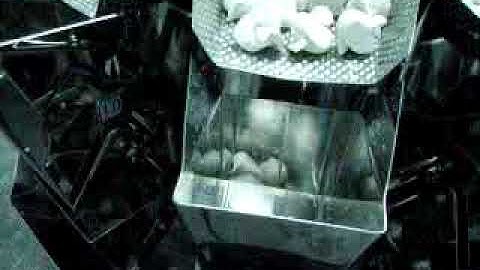 Multi-heads dimple weigher packing machine for frozen dumpling