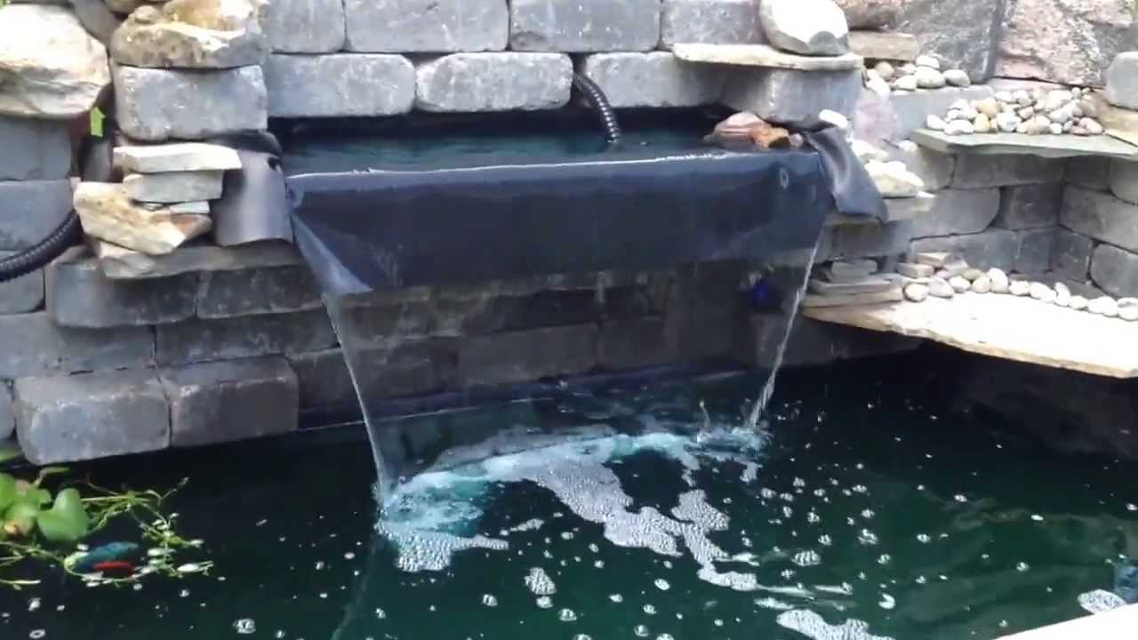 DIY Spillway for pond - YouTube.