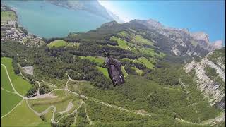Raw Wingsuit flying over Barns in Switzerland