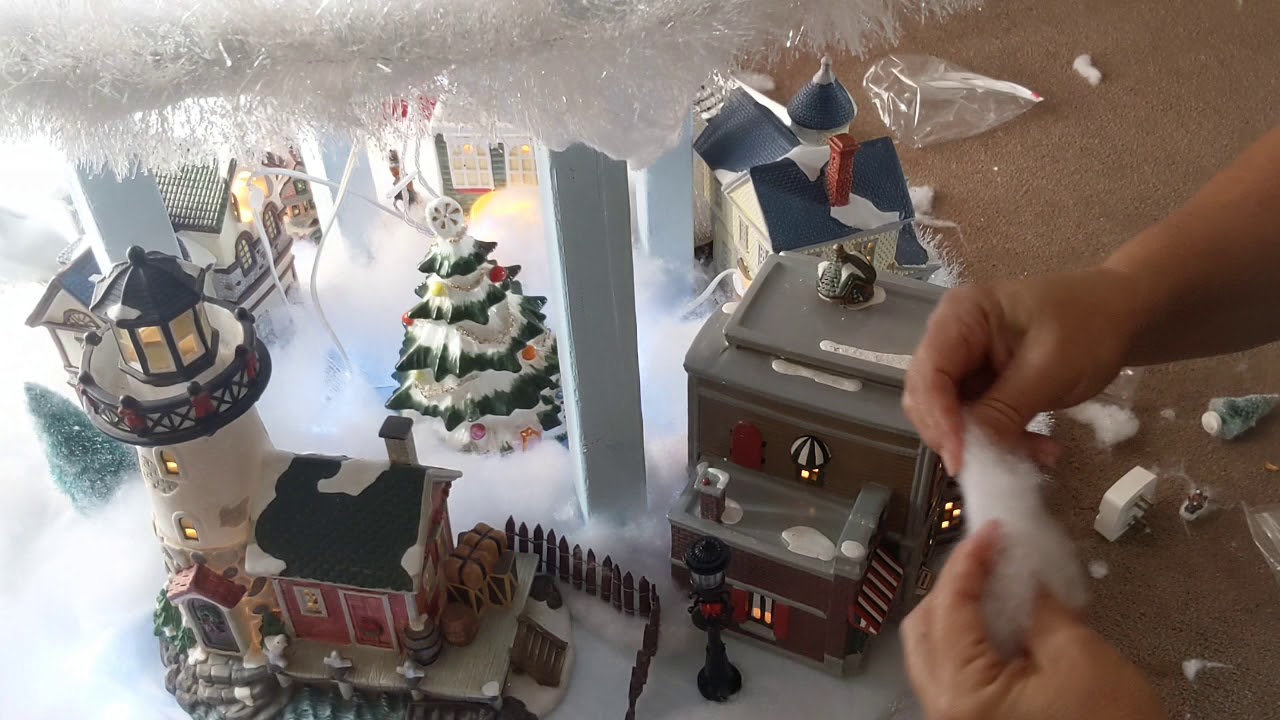Rotating Christmas Village stand. YouTube